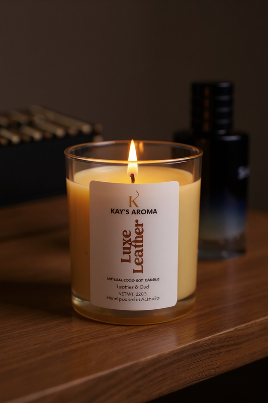 Luxe Leather candle showing rich leather, smoky oud, and warm amber fragrance notes