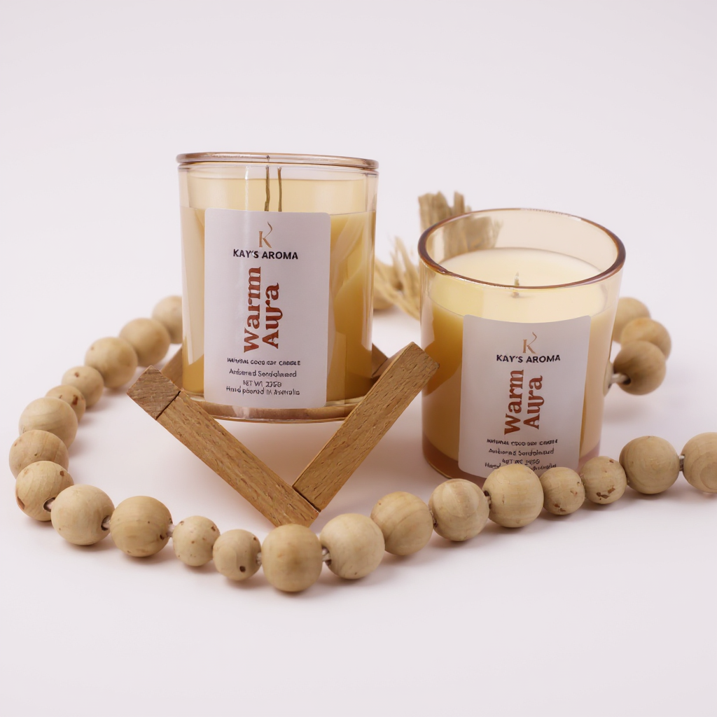Warm Aura candle showing ambered sandalwood fragrance notes