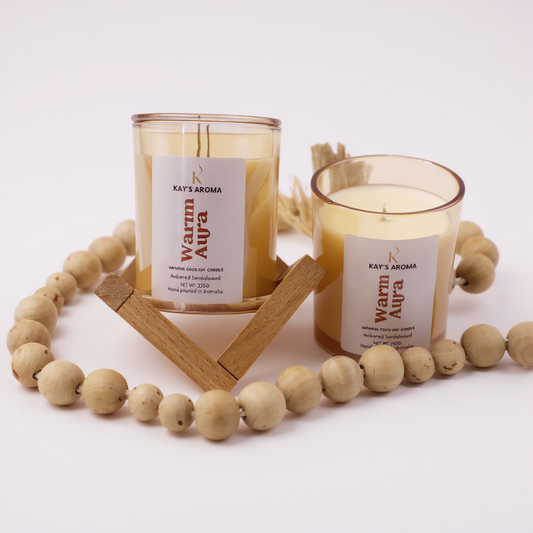 Warm Aura candle showing ambered sandalwood fragrance notes